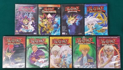 Lot of 9 Yu-Gi-Oh! Battle City Duels DVDs Volume 1 3 8 9 11 10 16 Shonen Jump -image