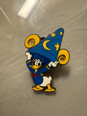 Disney pin Donald carrying sorcerer hat-image